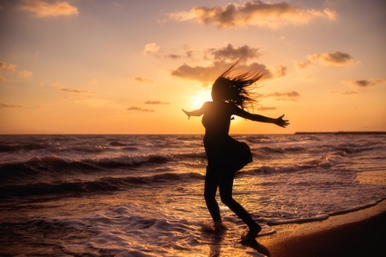 Happy Woman on Beach